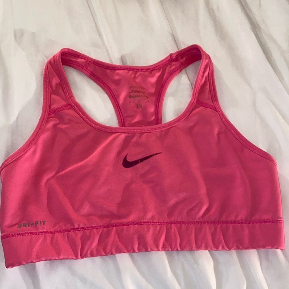 hot pink Nike sports Bra